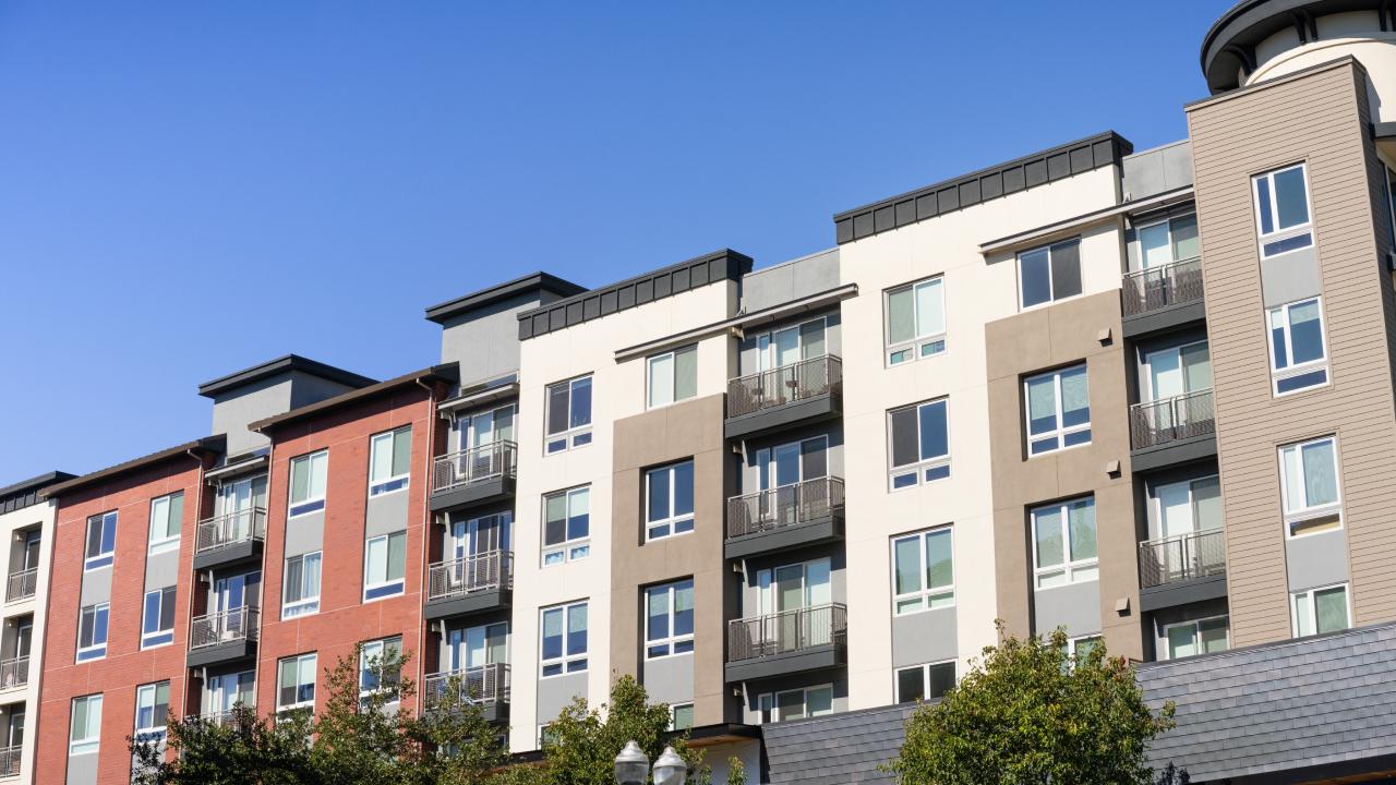 Modern apartment building with upwards view to the sky